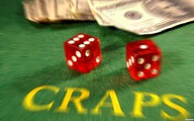 Live dealer spinning the French Roulette wheel
